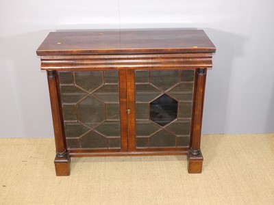 Lot 653 - A 19th century rosewood double-door astragal...