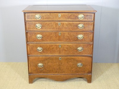 Lot 658 - A mid-Georgian style figured walnut, cross and...