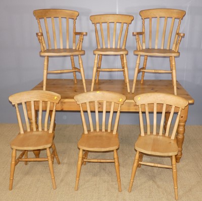 Lot 665 - A modern pine round cornered farmhouse kitchen...