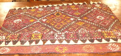 Lot 762 - A Turkish Kilim woollen rug fragment, 47 x 82cm
