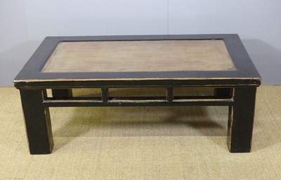 Lot 675 - An Oriental black painted rectangular low...