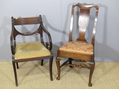Lot 685 - A 19th century mahogany barback scroll elbow...