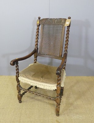 Lot 689 - An antique walnut framed and cane inset scroll...
