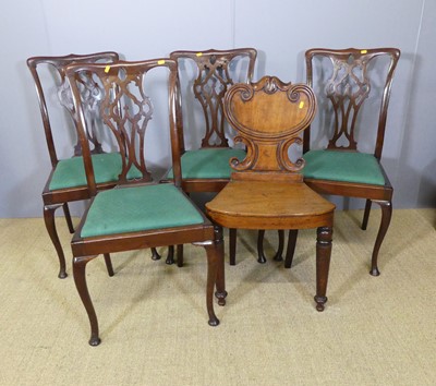 Lot 693 - A set of four mahogany Chippendale style...