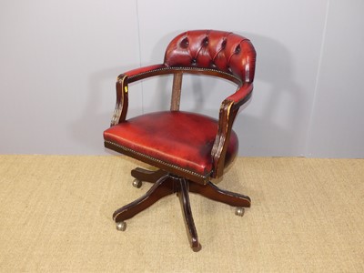 Lot 696 - A contemporary mahogany red leather buttoned...