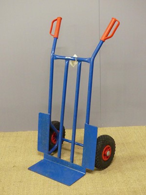 Lot 751 - A blue painted steel sack barrow, on pneumatic...