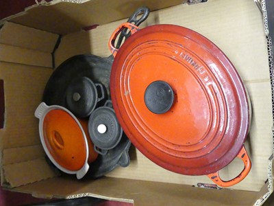 Lot 124 - A Le Creuset red enamelled cast iron casserole...
