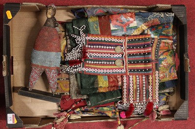 Lot 131 - An African carved softwood and beaded figure,...