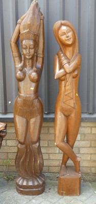 Lot 754 - Two Indonesian carved hardwood semi-nude...
