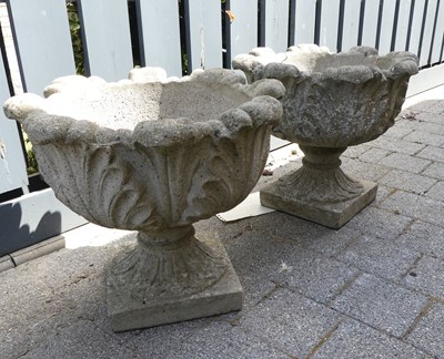 Lot 760 - A pair of concrete pedestal leaf decorated...