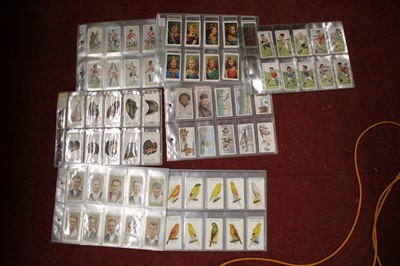 Lot 160 - A collection of cigarette cards, to include...