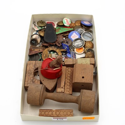 Lot 179 - A collection of badges, to include a green...
