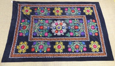 Lot 723 - A pair of embroidered Uzbekistani Suzani wall...