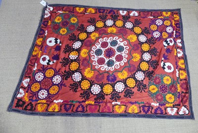 Lot 726 - An embroidered Uzbekistani Suzani wall hanging,...