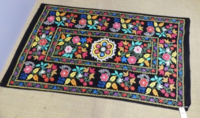 Lot 727 - An embroidered Uzbekistani Suzani wall hanging,...