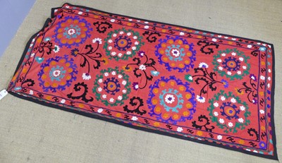 Lot 732 - An embroidered Uzbekistani Suzani wall hanging,...