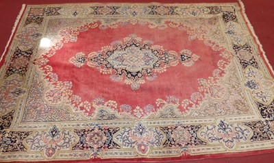 Lot 735 - A Persian woollen red, cream and blue ground...
