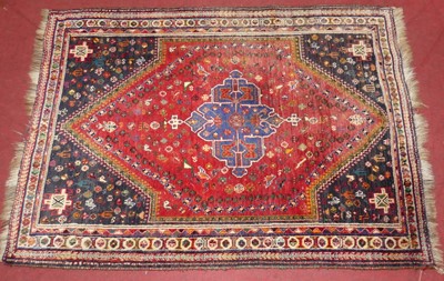Lot 741 - A Persian woollen red, blue and cream ground...