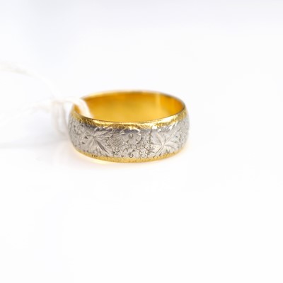 Lot 200 - A 22ct gold and platinum wedding band, sponsor...