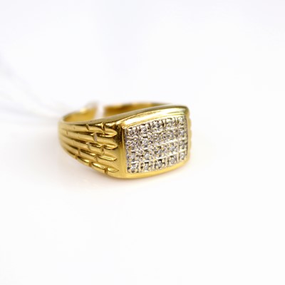Lot 205 - A modern 18ct gold diamond set signet ring,...