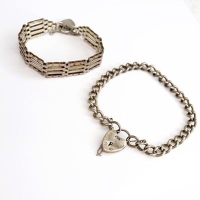 Lot 220 - A silver curblink bracelet; together with a...