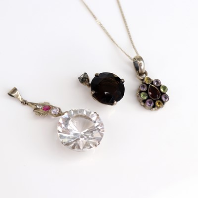 Lot 221 - A white paste set pendant; together with a...